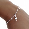 Pulsera cadena combinada bolas rayos colgando